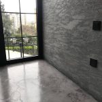 Romabio Slaked Lime Unico Plasters, the perfect way to get that microcement look for bathrooms, floors, and kitchens.